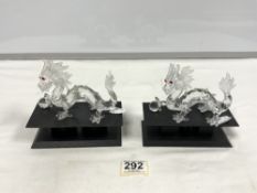 TWO SWAROVSKI CRYSTAL DRAGONS ON STANDS