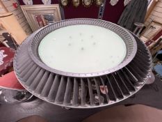 A METAL UFO DESIGN COFFEE TABLE