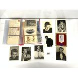 SIX JAMES DEAN PHOTO CARDS, ONE MARILYN MUNROE CARD, A 1953 H. M. Q. ELIZABETH II SILK TASSEL,