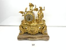 ORNATE GOLD COLOURED FIGURAL MANTLE CLOCK ON A MARBLE BASE - QUARTZ MOVEMENT