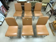 A SET OF SIX ITALIAN RETRO DESIGN FAUX LEATHER AND TUBULAR DINING CHAIRS MADE BY CALLIGANS, ITALY