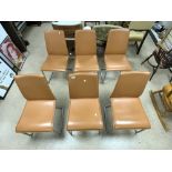 A SET OF SIX ITALIAN RETRO DESIGN FAUX LEATHER AND TUBULAR DINING CHAIRS MADE BY CALLIGANS, ITALY