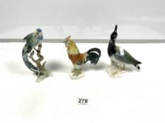 THREE GERMAN PORCELAIN FIGURES OF BIRDS, 19.5CMS