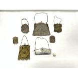 SILVER-PLATED EVENING PURSE, AND SIX VINTAGE CHAIN EVENING PURSES