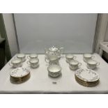 A 26 PIECE DUCHESS PORCELAIN FLORAL DESIGN TEA SET