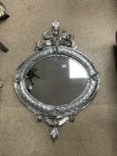 MODERN POLISHED METAL DECORATED OVAL WALL MIRROR WITH BIRDS IN A NEST DETAILING, 74 X 70CMS