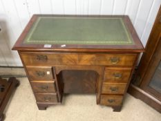 GEORGIAN STYLE MAHOGANY KNEEHOLE DESK, WITH SEVEN DRAWERS AND CUPBOARD ON BRACKET FEET AND TODED