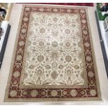 PERSIAN DESIGN RED BORDERED AND CREAM FLORAL PATTERN CARPET, 240 X 320CMS