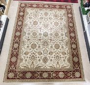 PERSIAN DESIGN RED BORDERED AND CREAM FLORAL PATTERN CARPET, 240 X 320CMS