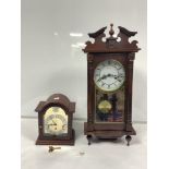 MAHOGANY WALL CLOCK MADE BY LINCOLN AND MAHOGANY MANTLE CLOCK WITH A TWO JEWEL UNADJUSTED CHIMING