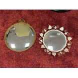 A GILT FRAMED CIRCULAR CONVEX WALL MIRROR AND PAINTED METAL FRAMED CIRCULAR CONVEX WALL MIRROR,