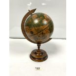 REPRODUCTION OF TERRESTRIAL GLOBE ON CARVED WOODEN STAND, 35CMS APPROX