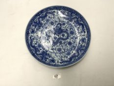 A 20TH CENTURY CHINESE BLUE AND WHITE CHARGER WITH DRAGON DECORATION, 36CMS DIAMETER