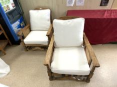 A PAIR OF 1930S OAK ADJUSTABLE BERGERE ARM CHAIRS WITH LOOSE CUSHIONS