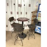 A METAL BISTRO SET - COMPRISING A BOTTLE TOP TABLE AND THREE BAR STOOLS