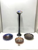 A TALL CARNIVAL GLASS VASE, 60CMS, AND THREE CARNIVAL GLASS BOWLS
