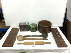 TWO AFRICAN WOODEN SPOONS, A BALINESE CARVING, ANOTHER CARVING, AND TWO BUTTER PLATES WITH A