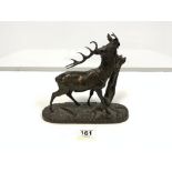 A BRONZE FIGURE OF A STAG REACHING FOR LEAVES, SIGNATURE TO BASE P.J.MENE, 22CMS