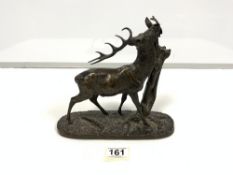 A BRONZE FIGURE OF A STAG REACHING FOR LEAVES, SIGNATURE TO BASE P.J.MENE, 22CMS