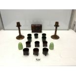 VINTAGE BAKELITE GREEN EGG CUPS, CONDIMENT SETS AND A PAIR OF FAUX TORTOISESHELL CANDLESTICKS