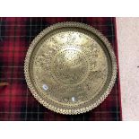 A LARGE CIRCULAR BURMESE ENGRAVED BRASS TRAY WITH ANIMAL DETAILING, 69CMS