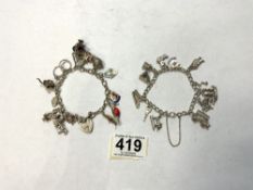 TWO SILVER 925/STERLING CHARM BRACELETS WITH 25 CHARMS, 75 GRAMS