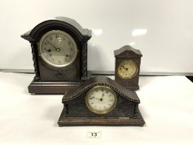 OAK MANTLE CLOCK WITH BARLEY TWIST COLUMNS AND SILVERED DIAL, AND TWO SMALLER OAK MANTLE CLOCKS