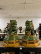 A PAIR OF 20TH CENTURY CHINESE GLAZED DOGS OF FOO GARDEN ORNAMENTS ON OCTAGONAL BASES, 53CMS