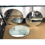 THREE UNFRAMED BEVELLED WALL MIRRORS, TWO CIRCULAR AND ONE OVAL