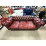 BUTTONED RED LEATHER THREE-SEATER CHESTERFIELD (A/F), 200 X 90CMS