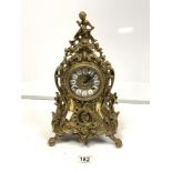 A 20TH-CENTURY ORNATE BRASS FRENCH STYLE MANTLE CLOCK, WITH A GERMAN MADE STRIKING MOVEMENT WITH
