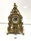 A 20TH-CENTURY ORNATE BRASS FRENCH STYLE MANTLE CLOCK, WITH A GERMAN MADE STRIKING MOVEMENT WITH