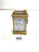 BRASS CARRIAGE CLOCK - THE SUSSEX GOLDSMITHS CO BRIGHTON, 11CMS WITH KEY