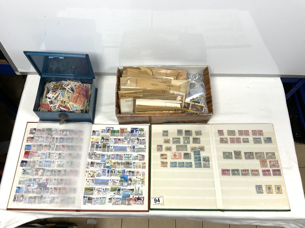TWO STAMP ALBUMS CONTAINING WORLD STAMPS AND A QUANTITY OF LOOSE STAMPS