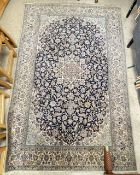 PERSIAN SILK CREAM AND BLUE GROUND PATTERNED CARPET, 270 X 172CMS