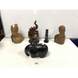 A PAIR OF CARVED WOODEN BALANESE BUSTS, CARVED WOODEN ELEPHANT, CANDLESTICK, AND BLACK ELEPHANT