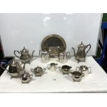 TWO SILVER-PLATED TEA AND COFFEE SETS AND A CIRCULAR PLATED TRAY