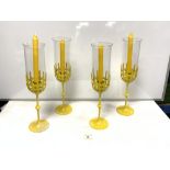 SET OF FOUR YELLOW BJORN WIINBLAD STORM LAMPS, 45CMS