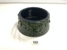 BJORN WIINBLAD GREEN GLAZED POTTERY BOWL WITH RAISED MOTIF AND INCISED DETAILING, 21 X 11CMS