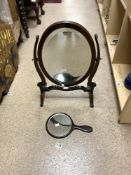 OVAL MAHOGANY SKELETON SWING FRAME MIRROR, AND A ROSEWOOD HAND MIRROR