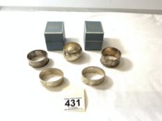 FIVE HALLMARKED SILVER NAPKIN RINGS, TWO IN ORIGINAL BOXES