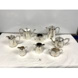 TWO SILVER-PLATED FOUR-PIECE TEA AND COFFEE SETS - ONE FOR BARKERS DEPT STORE