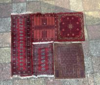 RED GROUND BAKARA RUNNER RUG, 190 X 64CMS AND FOUR OTHER PERSIAN RED GROUND RUGS