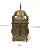 A LATE 19TH CENTURY ENGRAVED AND PIERCED BRASS LANTERN CLOCK WITH PILLAR SUPPORTS AND A GERMAN