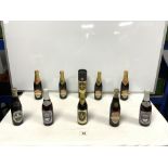 FIVE BOTTLES OF GUINNESS CHRISTMAS EDITION FROM 1980'S, TWO BOTTLES FOR GOLD AND SILVER JUBILEE, AND