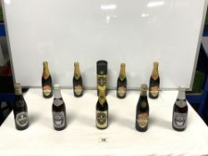 FIVE BOTTLES OF GUINNESS CHRISTMAS EDITION FROM 1980'S, TWO BOTTLES FOR GOLD AND SILVER JUBILEE, AND