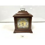 A FRANZ HERMLE TRIPLE CHIME MANTLE CLOCK WITH KEY AND INSTRUCTIONS