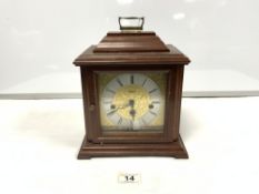 A FRANZ HERMLE TRIPLE CHIME MANTLE CLOCK WITH KEY AND INSTRUCTIONS