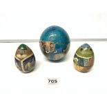 A PAINTED OSTRICH EGG, AND PAINTED EGG-SHAPE ORNAMENTS