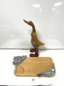 MEAT CARVING BOARD AND CARVED WOODEN FIGURE OF A DUCK, 48CMS